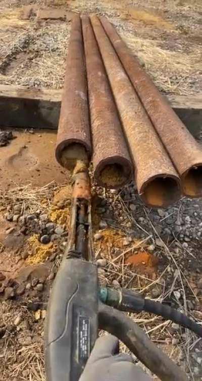 Removal of packed sand.