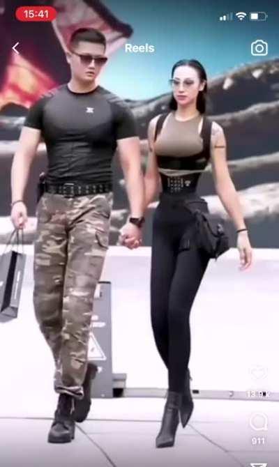 the shopping bag becomes a different shape when it’s passed in front of her legs