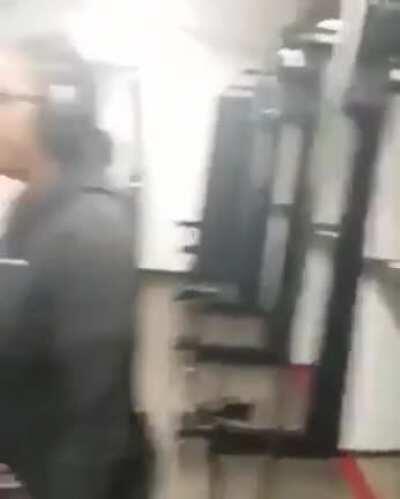 Holding a shotgun like this