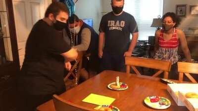 My 15th birthday party. Couldn’t blow out the candles with my mask on, so I had to improvise.