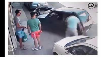 Lifting his car to move from the parking spot