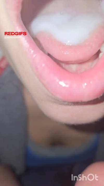 Mouth full of cum