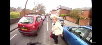 Biker hits lady while lane splitting