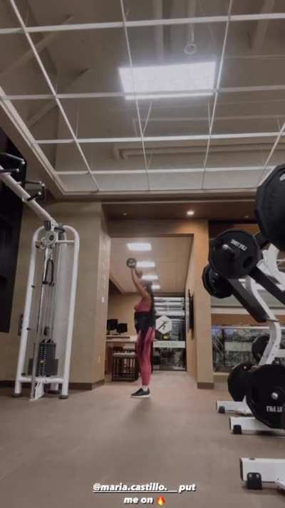 Serayah Doing Side Step Squats In Pink Leggings