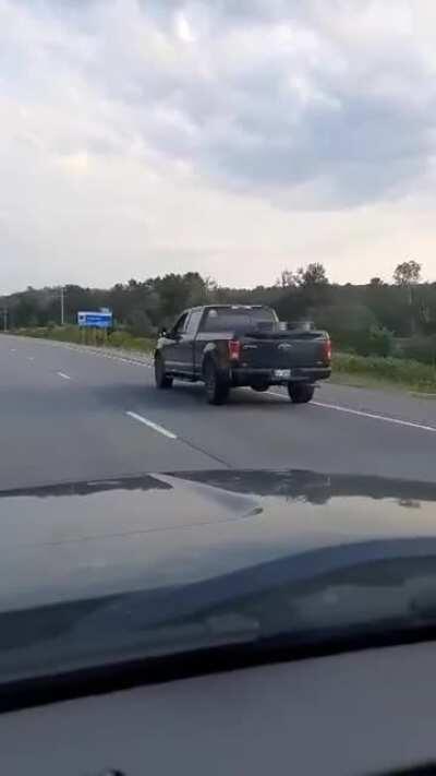 Jerk drops his phone out the window on highway. Story in comments