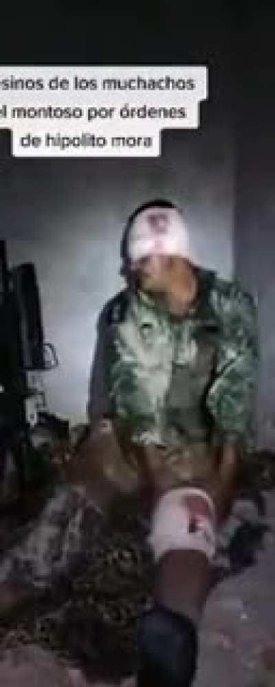 Interrogating a CJNG sicario.