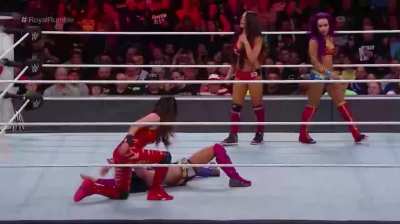 The Bella Twins and Sasha Banks beating Asuka up