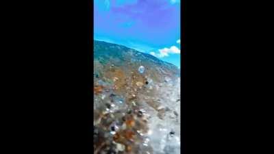 All the pebbles under water