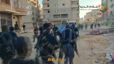 Footage showing Sudanese Army Armored Corps infantry operations against RSF rebels to control Gaza neighborhood