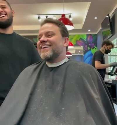 Brazilian barber gives his clients a kiss on the cheek!