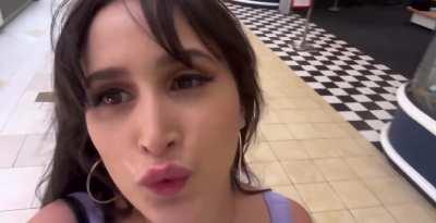 She us putting her makeup on before going to mall