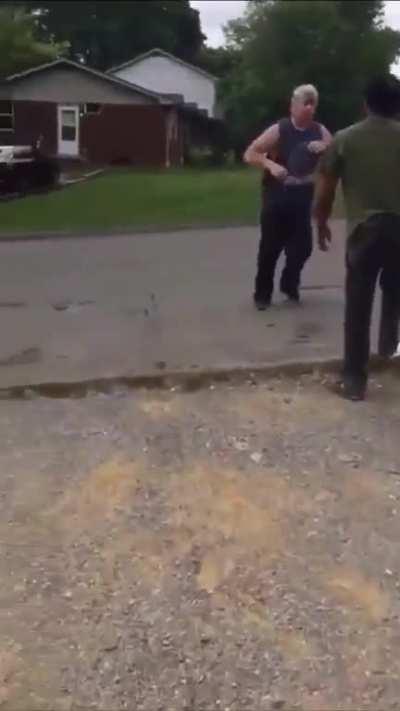 Just two old guys fighting and one snapping his leg