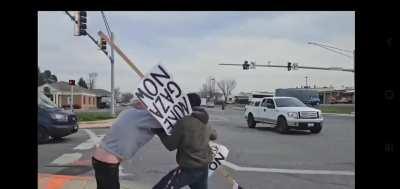 Boomer with a provocative sign gets laid tf out for snatching a phone