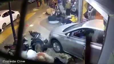 car crashes into crowd at celebrity signing in Mendoza Argentina. Source in comments