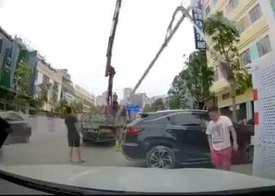 Street Light Falls On Top Of Man's Head