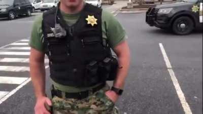 8 cops for one man with a camera