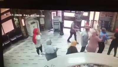 School Principal (the guy in dark blue who puts glasses down) fights a student's parent ( one in black who starts the fight ) and tries to suplex him but backfires (broken shoulder and his head got injured) Happened 2 days ago