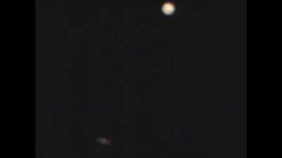 Ich konnte die Große Konjunktion von Jupiter und Saturn durch eine Wolkenlücke in Berlin filmen