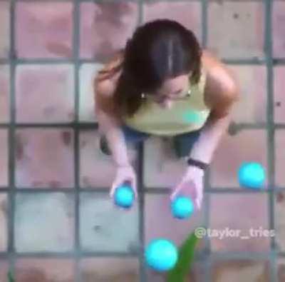 top view of someone juggling balls