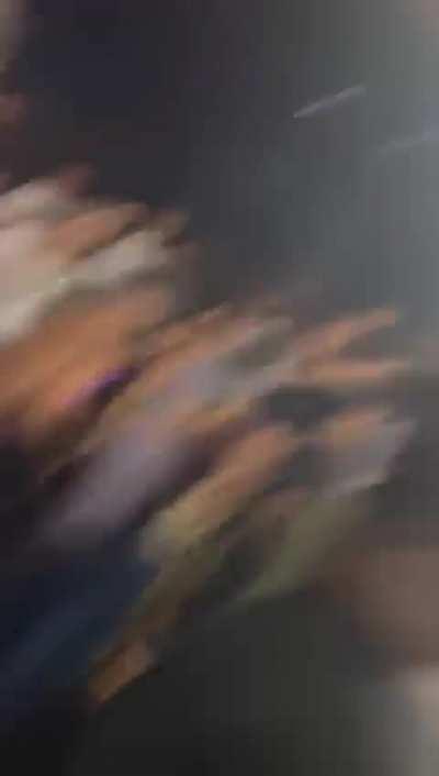 Chaotic brawl scene in nightclub as 2 influencers and their cliques go at it. 