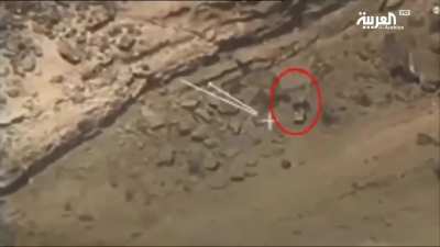 Video shows a pickup truck and Houthis near it flying after being bombed by the Saudi Air Force on the Yemeni-Saudi border (date unknown)