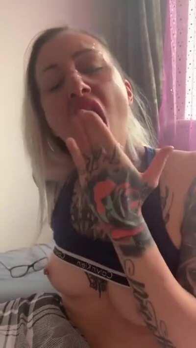 Licking cum off her glasses