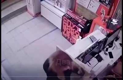 Trying to rob a store with a tazer