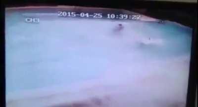This is a Swimming pool during an earthquake