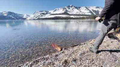 Just throwing some pebbles on a lightly frozen lake (sound on)