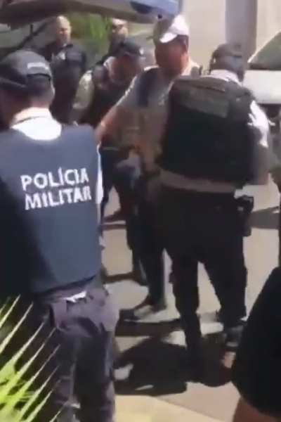 The strong lady kept kicking everything when she was getting arrested.