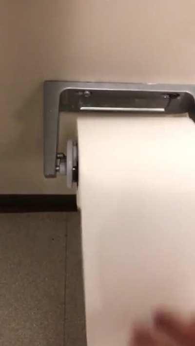 The toilet paper dispenser at my office only allows you to take 2-3 rolls before it tears.