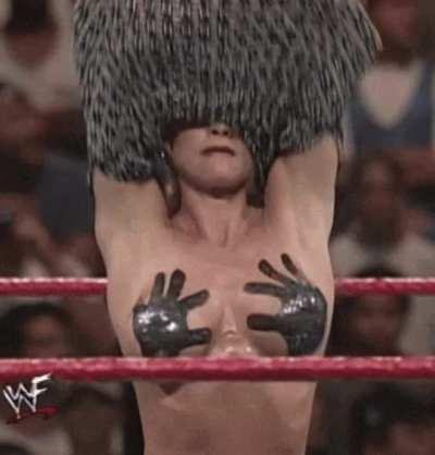 Sable taking off her top