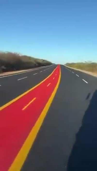 The new bike path on the middle of the highway in Piauí, Brazil.