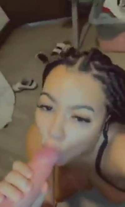 Gorgeous black babe with huge tits sucking on a BWC