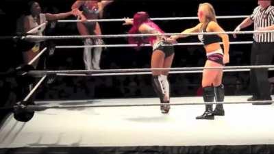 Natalya welcoming Sasha Banks to the main roster with a wedgie