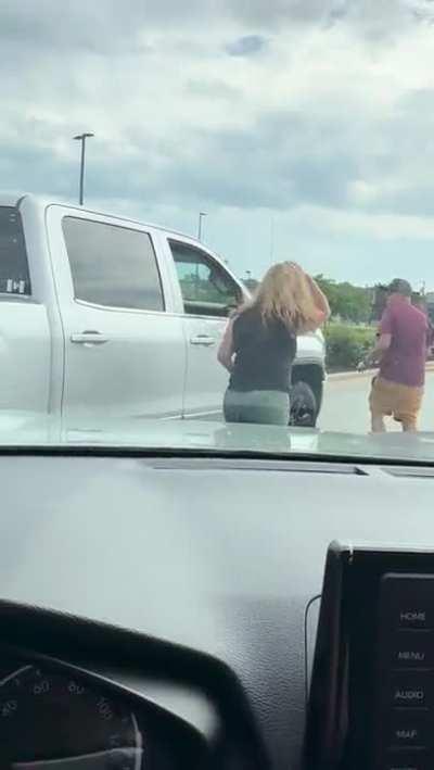 to angrily punch out a window after sideswiping another driver