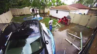 Man crashes through pool in persons backyard