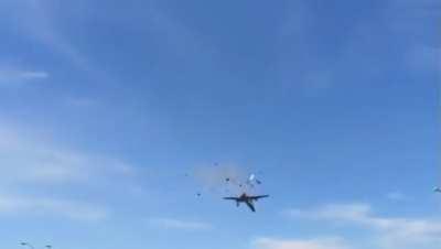 B-17 Texas Raiders hit by P-63 Kingcobra. Wings over Dallas air show.