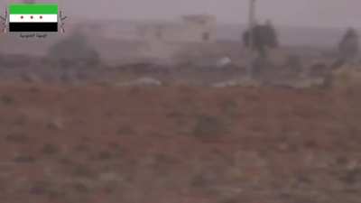 FSA 1st Artillery Regiment targets Syrian Army holdouts with rifle & techincal fire near al-Maasara - 2014