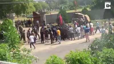 Parachuter hits power lines as crowds watch