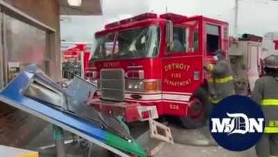 Accident involving a firetruck, van and a gas pump in Detroit Michigan