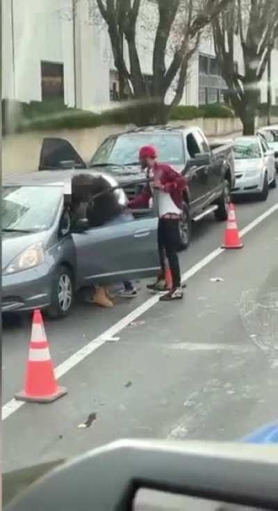 Woman gets dragged out of her car and face stomped during road rage incident