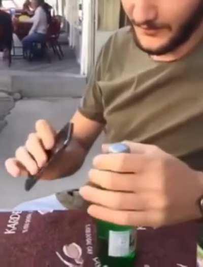 Using your phone to open a beer