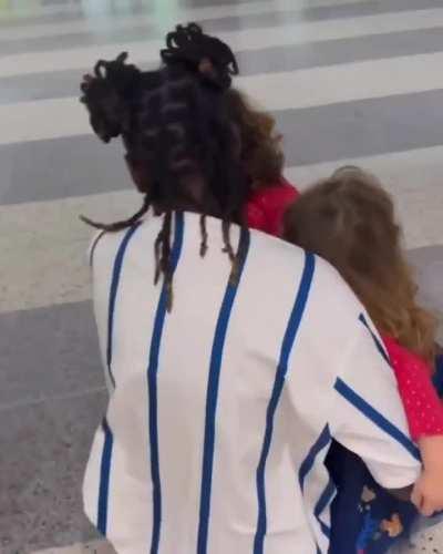 Nanny who went viral last month after she and the kids she looks after broke into uncontrollable tears at the airport as she left for her home country is back.