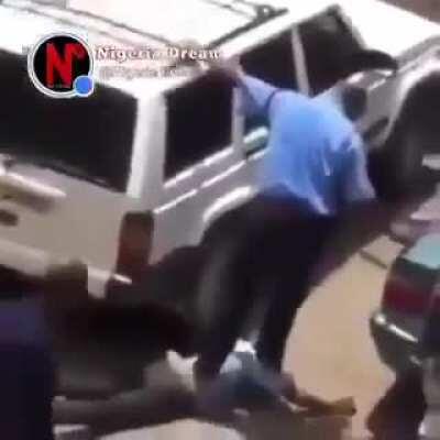 Nigerian SARS Police Brutally Stomping On Mans Head