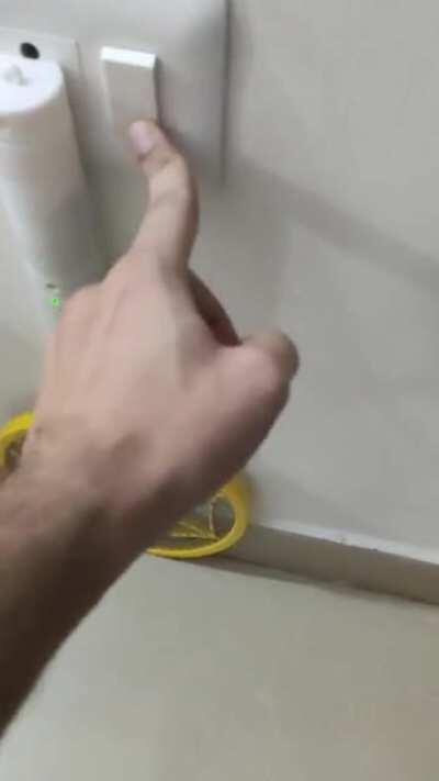 The way this insect repellent racket fits into this wall socket.