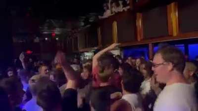 [Sound ON!] At a concert in Boston, the house music got the crowd fired up before the show. It worked a little too well.