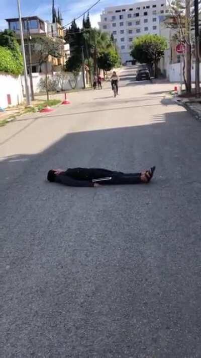 Trying to jump with a bike over your friend