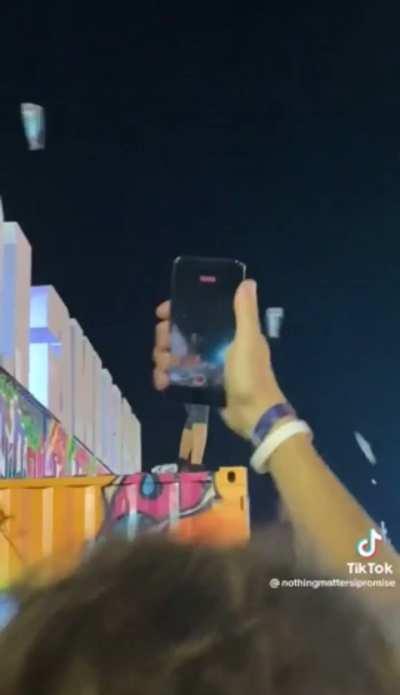 Guy at a festival who thinks he’s the main character gets pummeled with trash.