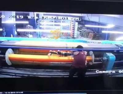This textile mill worker should have been more careful